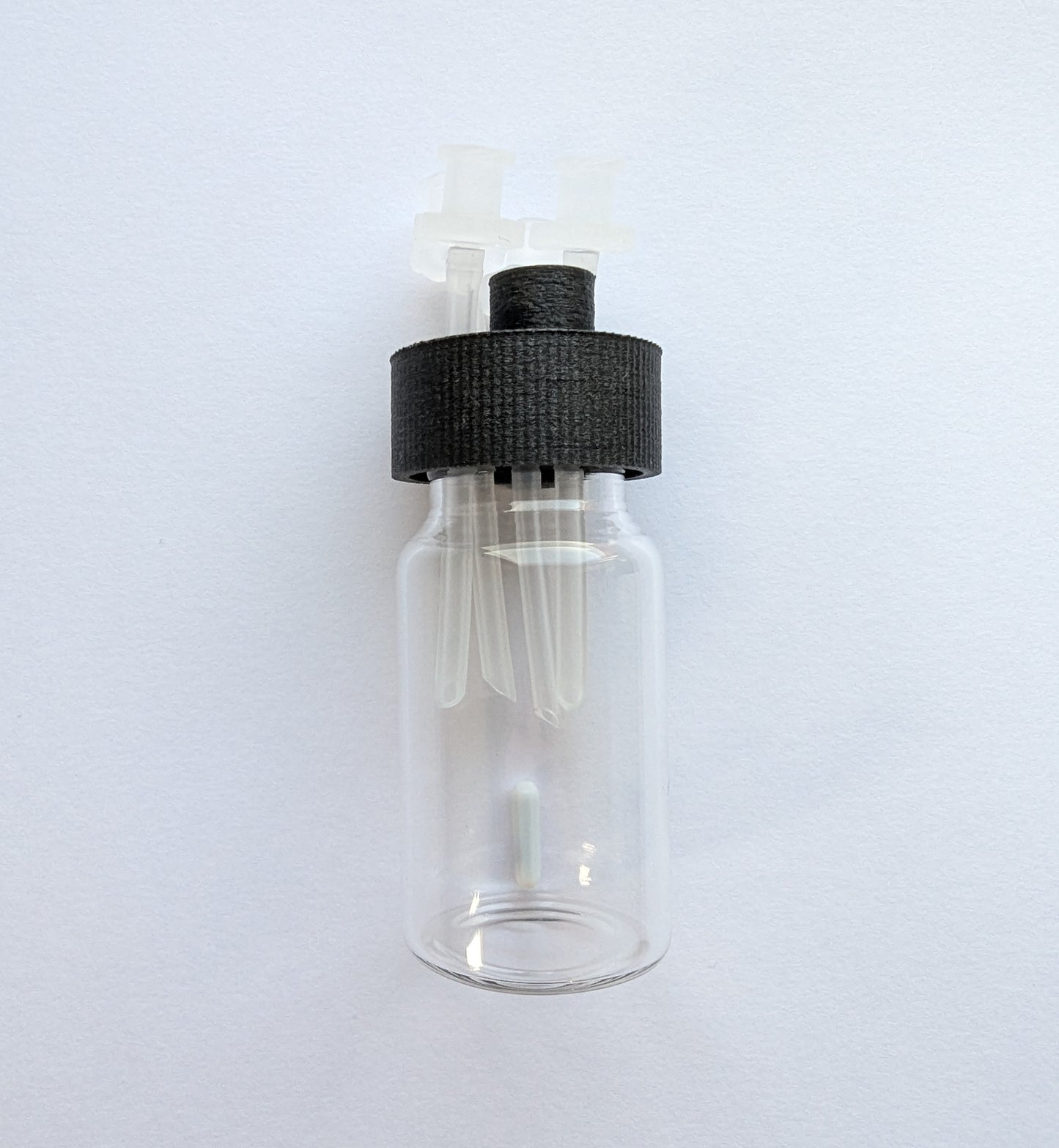 20ml glass vial, cap A with ports, and stir bar